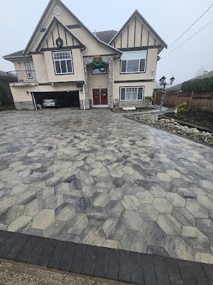 Tumbled cobblestone paver driveway at a Langley home